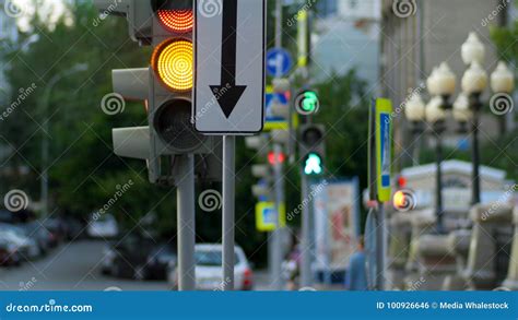 A Busy Downtown Intersection Traffic Light Intersection People