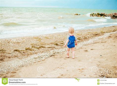 Happy Boy Enjoys Life On Summer Beach Stock Photo Image Of Person