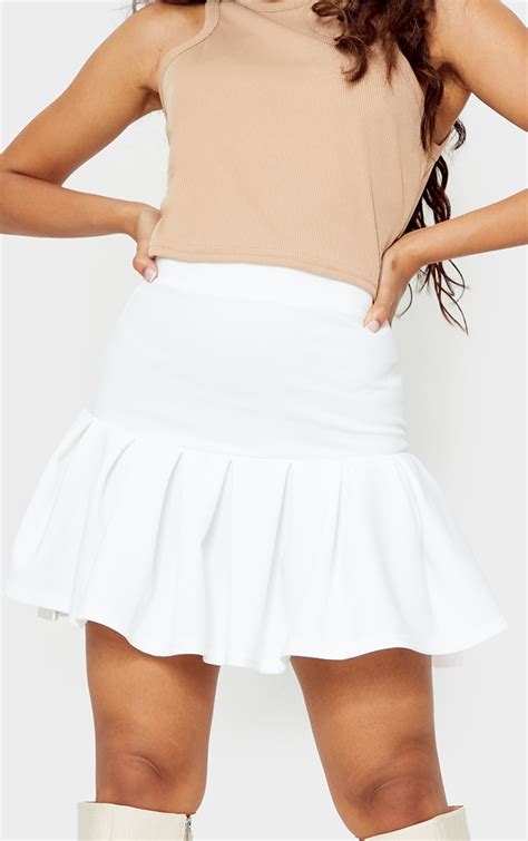 Petite White Pleated Step Hem Mini Skirt Prettylittlething Usa