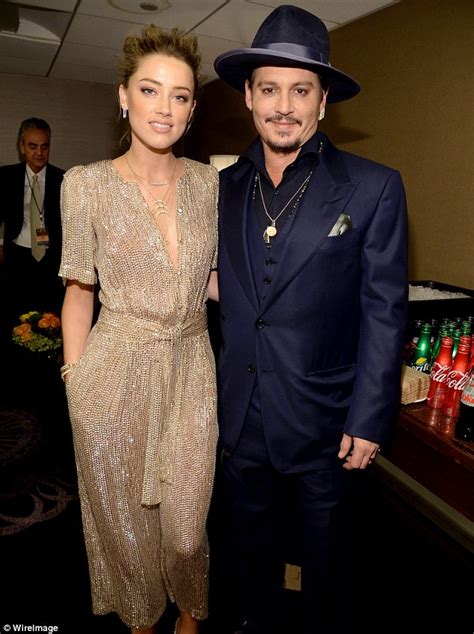 Heard he had two witnesses to the events that took place on the night of the incident and once again called the allegation of him hurling a. Johnny Depp and Amber Heard bring retro glamour to ...