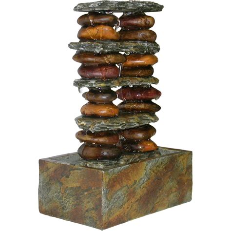 The tranquil sounds of flowing water will enhance your environment's ambiance while also serving as a decorative art piece. Stone Tabletop Fountain | Fountain Design Ideas