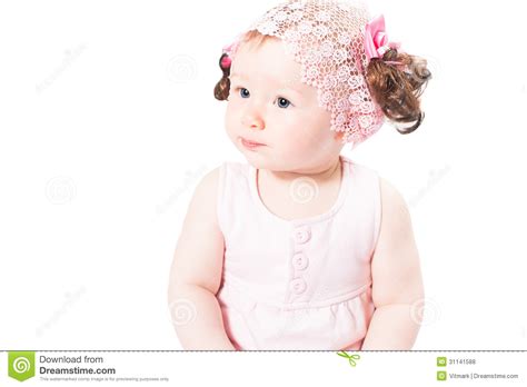 Little Cute Baby Girl With Blue Eyes In Pink Dress