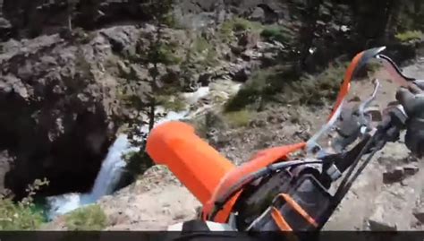 Video Man Rides Off 70 Foot Cliff Into Stream RevZilla
