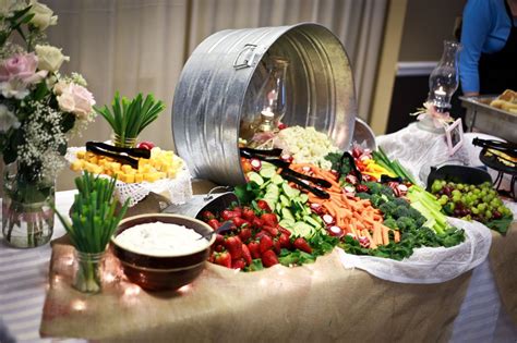 Rustic wedding accessories have become all the rage in the wedding industry. Tyler & Margaret's Wedding | Wedding food table, Wedding ...