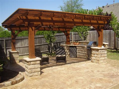 Building an outdoor brick barbecue pit is easy if you follow the right plans, designs, materials and ideas. Pergola with built in BBQ, nice outdoor seating area too ...