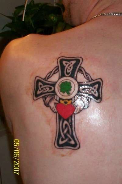 These types of tattoo designs can be portrayed as celtic cross alone or with other elements or symbols. celtic cross tattoo