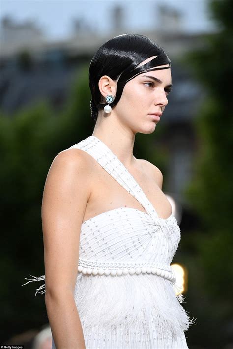 kendall jenner oozes opulence in ivory gown and 1920s style on givenchy runway daily mail