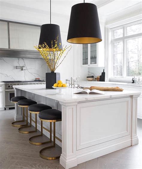 As kitchens have adopted a more prominent role in our homes and our lives, so their designs have been customised to take on more of the personality and. A gorgeous kitchen island💕 The black and gold colors bring ...