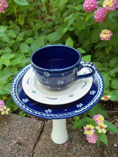 After she carefully climbs up the plant to reach him, she accepts his gift and the pair form an almost perfect heart shape. Tea cup bird feeder using a vase turned upside down to ...