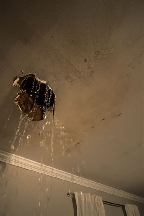 Upstairs Shower Leaking Ceiling Below Shelly Lighting