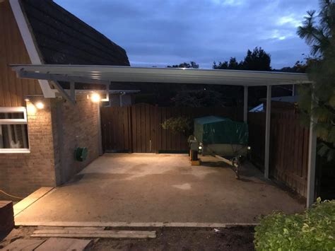 Choose your carport or shelter. A Contemporary Carport Installed in Hampshire | Kappion ...