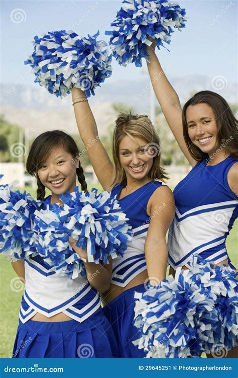 Cheerleaders Holding Pom Poms Stock Image Image 29645251