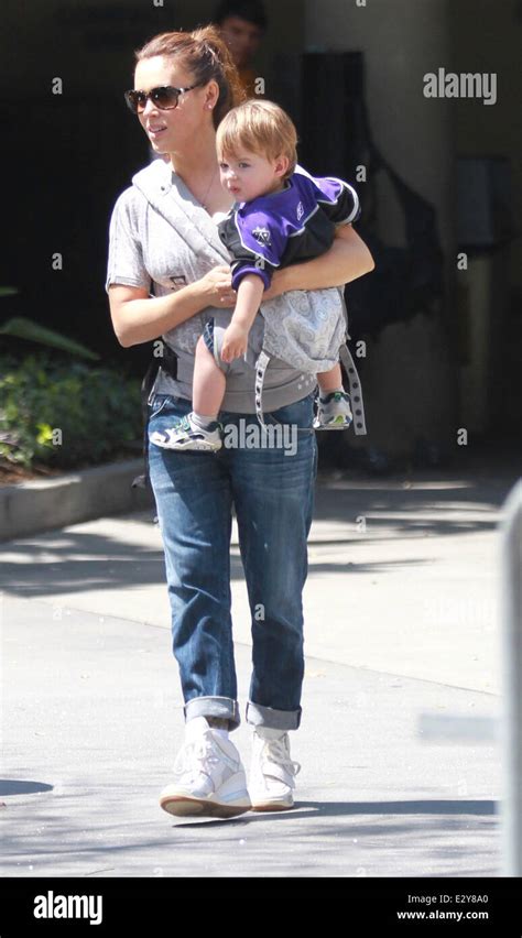 Alyssa Milano Carries Her Son Milo Thomas As She Leaves The Los Angeles