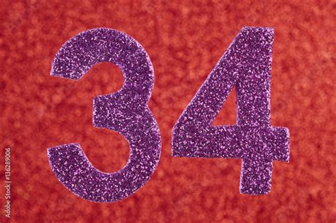 Number Thirty Four Purple Color Over A Red Background Anniversa