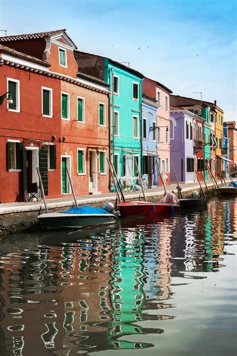 Colorful Houses Of Burano And Boats In The Water Italy Stock Image