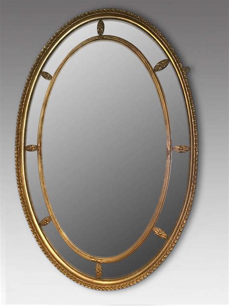 Antique gilt oval wall mirror in Antique Wall Mirrors