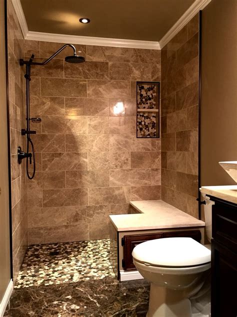 Brown tiled public men& x27;s bathroom with 3 urinals. Bathroom design marble tile bathroom brown marble beige ...