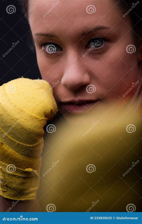 Close Up Portrait Of Young Woman Boxer Ready To Fight Stock Image