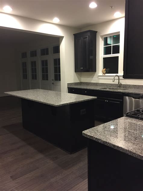 Ahh, the comfort of a warm, stone gray kitchen. Fixed doors, Misty Grey 5" hardwood, Espresso Cabinets, New Caledonia Granite | Espresso ...