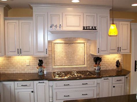 Jossandmain.com has been visited by 100k+ users in the past month tumbled marble backsplash with black granite countertops ...