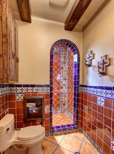 Go for mosaic glass tiles in a recurring border, or use a border of black tiles to divide a white and brown mosaic tile creation, breaking up the wall space. Home Decorating Ideas - The Spanish | Spanish style ...