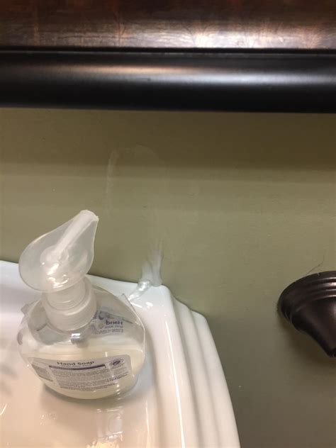 this soap dispenser turned the wrong way so now i have to wipe soap cum off the wall to wash my