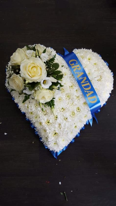 Grandad tribute a gorgeous mix of bronzes, oranges and greens. Funeral tribute White based heart with a royal blue ribbon ...