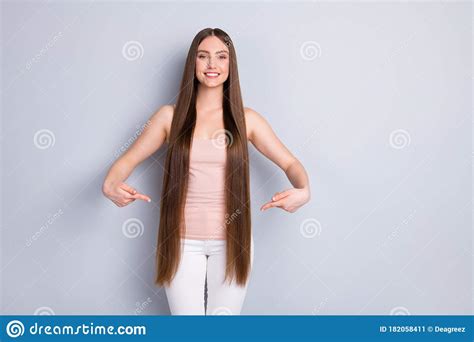 Photo Of Charming Appearance Model Lady Demonstrating Ideal Neat Long Hairstyle Directing