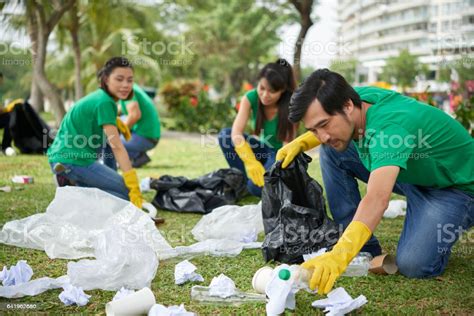 Its objectives are to conserve natural resources and the existing. Asian Man Taking Care Of Environment Stock Photo ...