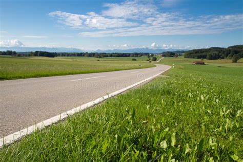 Country Road In Bavaria With View To The Alps Stock Image Image Of