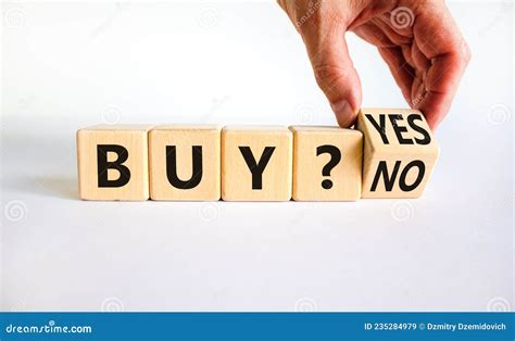 Time To Buy Symbol Businessman Turns A Wooden Cube And Changes The