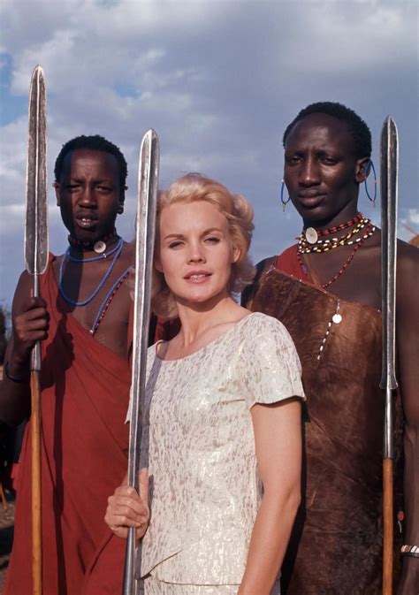 Carroll Baker with Maasai tribes people, while on location at Lake