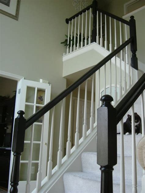An affordable staircase remodel option. painted the yellowy oak staircase banister | Around My ...