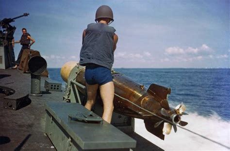 Photo Us Sailor Removing The Securing Lines Before Launching A Mark