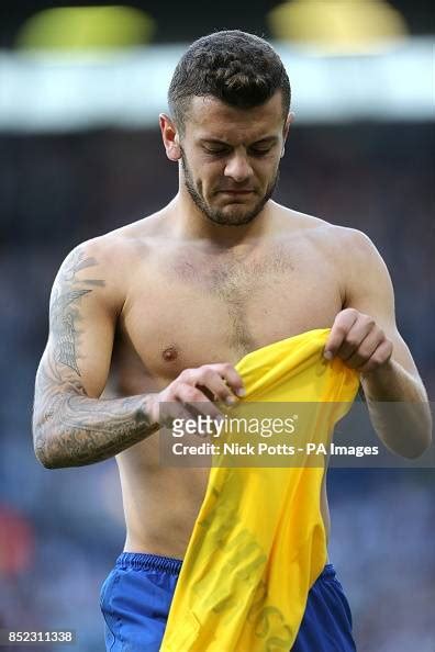 Arsenals Jack Wilshere Takes Off His Shirt After The Game News Photo