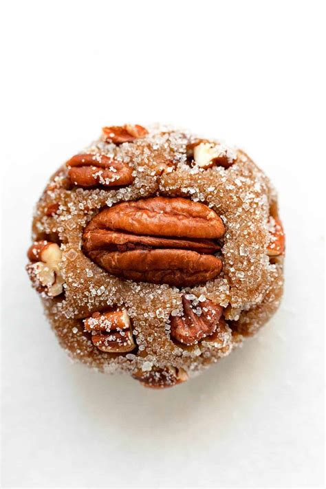 Using a medium cookie scoop, scoop balls of dough onto prepared baking sheets and bake until golden, 10 to 12 minutes. Butter Pecan Cookies | Foodtasia