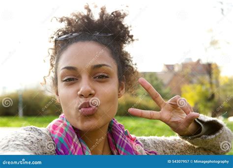 Cute Girl Making Fun Face With Peace Sign Stock Image Image Of