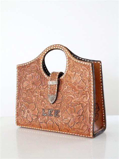 Shoulder bags come in all different types and sizes, and we're here to help you find the perfect travel bag for your next trip! A vintage tooled leather handbag circa 1950. The thick ...