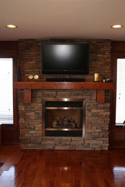 A stone hearth needs to be cleaned more frequently than brick fireplace hearths. Stone Fireplace | Stone fireplace pictures, Modern stone ...
