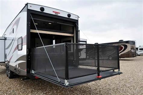 The main entry will allow you access to your cargo during stops, and during your stay so you can easily get to the full double entry bathroom or front bedroom. 2017 New Coachmen Adrenaline Toy Hauler 30QBS W/Slide, 5 ...