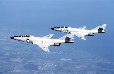 An Air To Air Left Side View Of Two F 101 Voodoo Aircraft In Flight