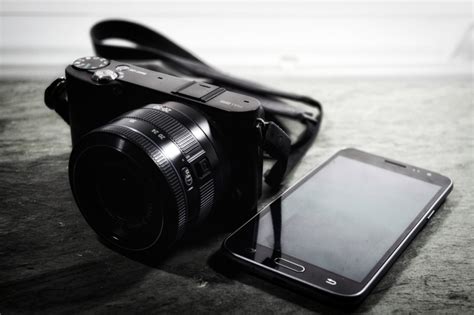 Trail cam that sends pics to phone. Camera with smartphone image - Free stock photo - Public ...
