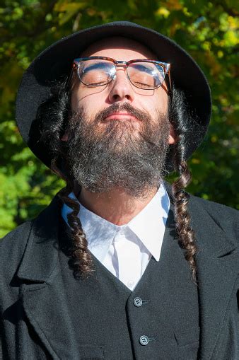 Portrait Of Young Orthodox Hasdim Jewish Man With Eyes Closed Stock