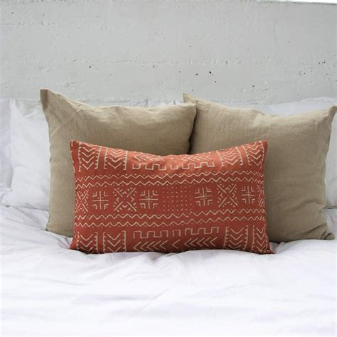 The lumbar pillow's contoured cushion helps maintain the natural curve of your spine, and it's even backed up by. Tribal Rust + Cream Lumbar Pillow - 14x22 | Pillows ...