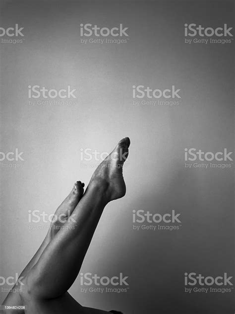 Black And White Feet Up In The Air Stock Photo Download Image Now