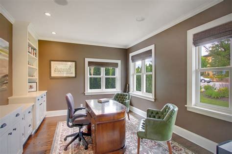 Her research challenges the thought that because people's response to color is subjective, it must also be unpredictable. Light brown paint color home office & library traditional with built in cabinets - Infosofa.com ...