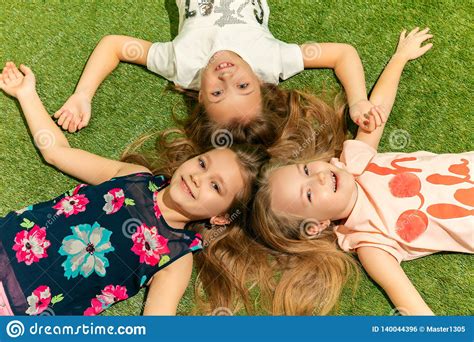 Group Of Happy Children Playing Outdoors Stock Photo Image Of Nature