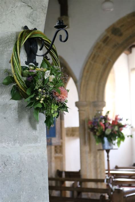 Join our community of happy customers in sioux flower supply near me. dressed willow circle hanging on a church candle holder ...
