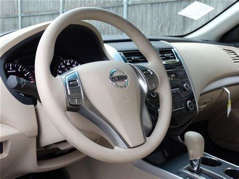 Sun light and other bright light fades the screen image so as to make it useless when backing the car. 2015 Nissan Altima Interior | Smalltowndjs.com