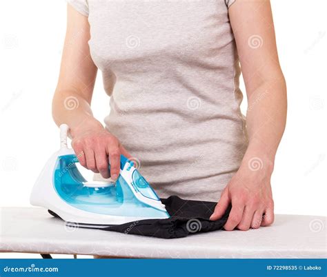 Steam Iron In Hands Women And Ironing Clothes On White Stock Image